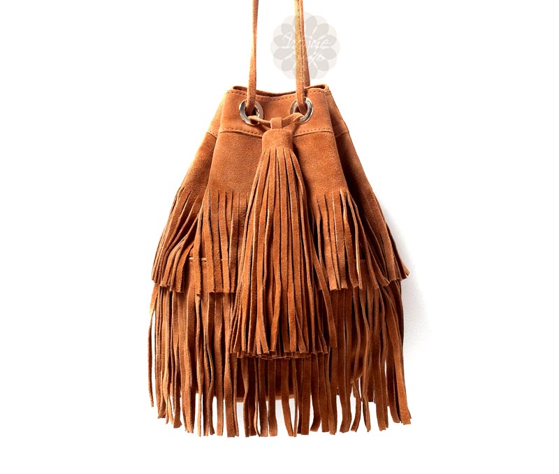 Vogue Crafts & Designs Pvt. Ltd. manufactures Brown Drawstring Fringe Bag at wholesale price.